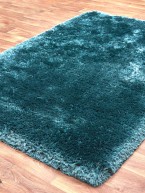 Plush Rust Terracotta Plain Handmade Polyester Shaggy Rug by Asiatic ...